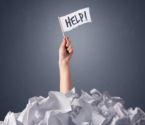 Tax-Resolution---Person-holding-up-a-help-sign